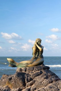 Golden mermaid statue on Samila beach