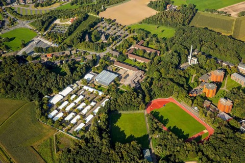 Police Academy Bork with tents for refugees