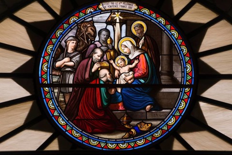 Church window of St. Catherine's Church with birth of Jesus Christ with Mary