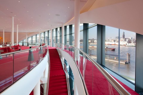 Stairs to the rank foyer with views of the city