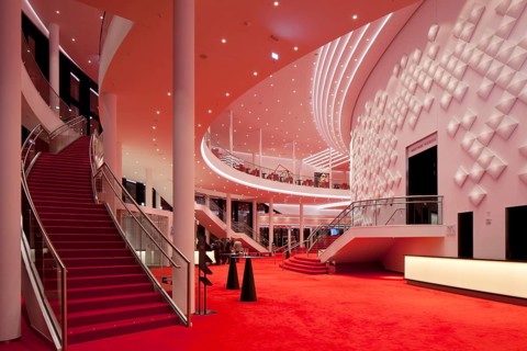 Large foyer on two floors with decorative light installation
