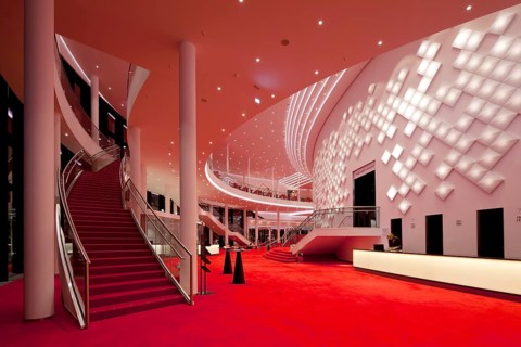 Large foyer on two floors with decorative light installation