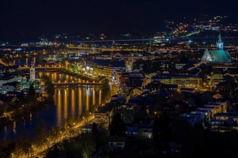 View of the town at night with Spitalkirche am Inn left and Stadtpfarrkirche right