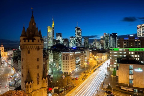 Skyline with Eschenheimer Tower city gate at night