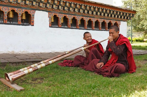 Monks playing tibetan horns