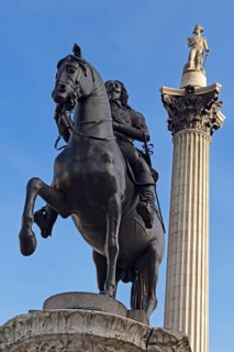 Equestrian statue of King Charles I with Nelson's Column at the back
