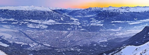 Innsbruck covered in snow at dusk
