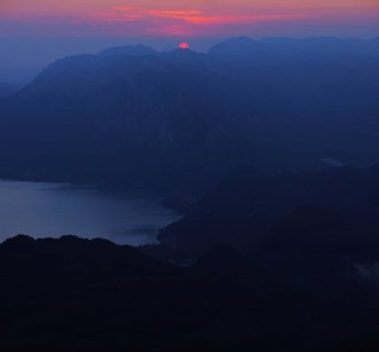 Sunrise over Attersee or Lake Atter and Hollengebirge mountain range