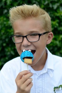 Boy eating a cake pop