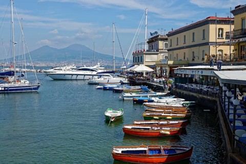 Restaurants and outdoor cafes along the harbor of Castel dell'Ovo