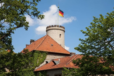 Sparrenburg or Sparrenberg Castle with waving flag
