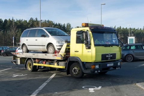 Car on tow-away vehicle