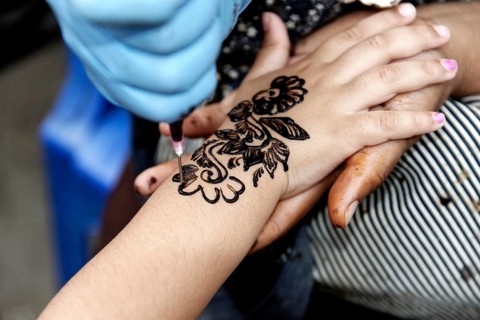 Henna tattoo on a woman's hand