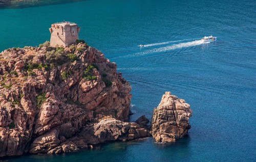 Genoese watchtower on cliff above the sea