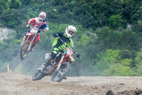 Two motorcyclists on motocross bikes
