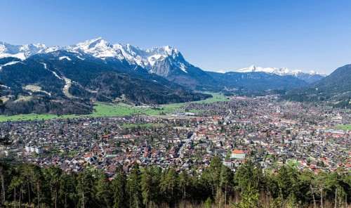 Townscape with the mountains Zugspitze and Alpspitze mountains