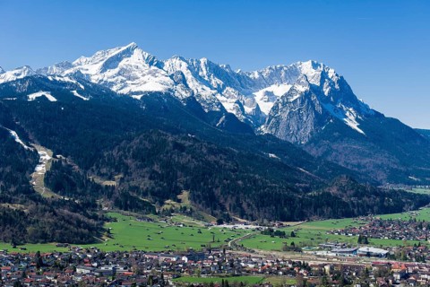 Townscape with the mountains Zugspitze and Alpspitze mountains