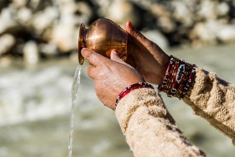 A female pilgrim praying