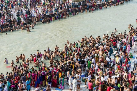 Masses of pilgrims are gathering for bathing at Harki Pauri Ghat at the holy river Ganges