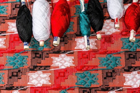 Colorful threads for weaving the Dhaka topi