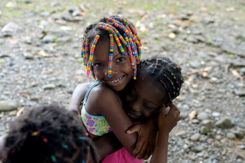 Two girls hugging each other