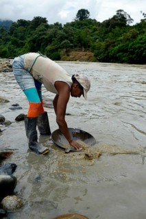 Woman washing gold