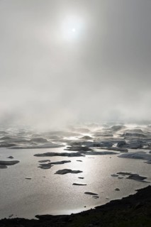Glacial lake in fog
