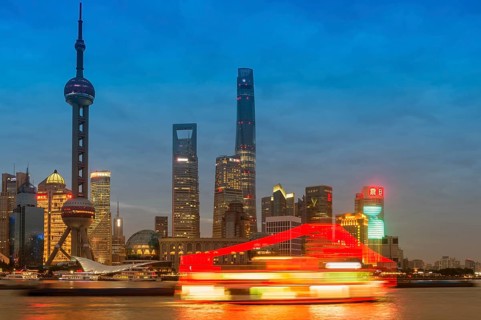 Pudong financial district with Oriental Pearl Tower at night