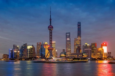 Pudong financial district with Oriental Pearl Tower at night