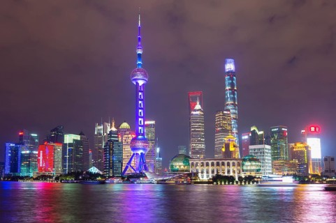 Pudong financial district with Oriental Pearl Tower at night