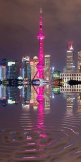 Pudong financial district with Oriental Pearl Tower at night