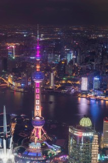 View over Pudong with Oriental Pearl Tower at night