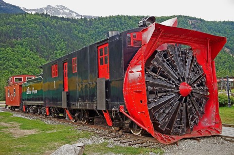 Historic locomotive with snow blower at train station