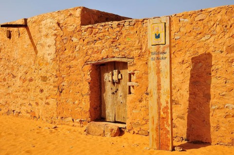 Old wooden door of an Islamic library in the historic centre