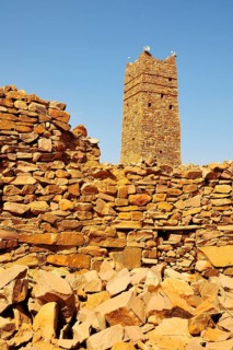 Ruins and minaret of the fortified trading post or Ksar