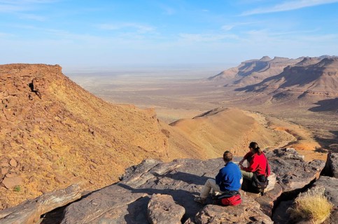 Tourists admiring mountain scenery at Amogjar pass