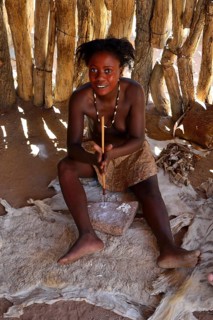 Damara woman making jewellery