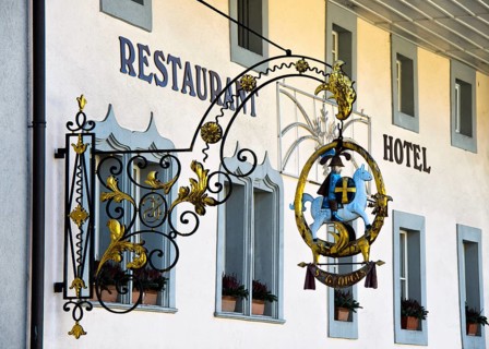 Restaurant sign with the horse-rider St. Georg