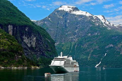 Cruise ship Silver Whisper and shuttle boat in Geiranger