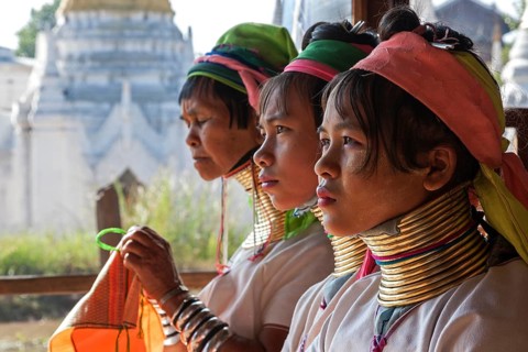 Women from the Padaung tribe in typical dress and headgear