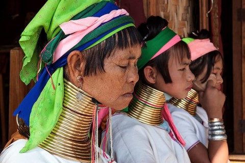 Women from the Padaung tribe in typical dress and headgear