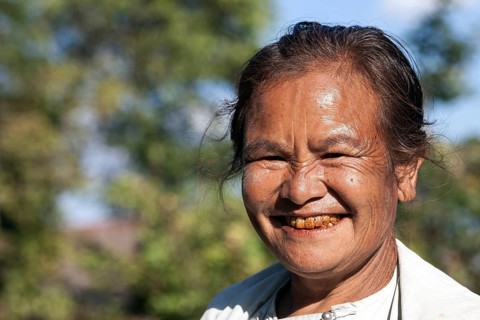 Old local woman laughing