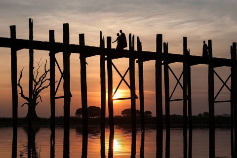 Two monks walking on the U Bein Bridge