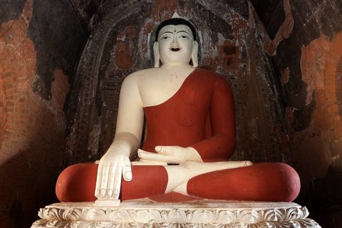 Seated Buddha with red robe