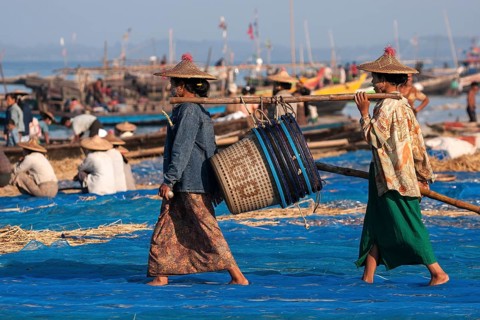 Local women wearing a straw hat