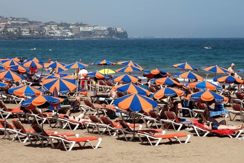 Beach with umbrellas and sunbeds