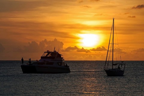 Sunset over the sea in the Beau Vallon Bay