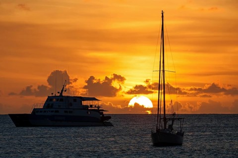 Sunset over the sea in the Beau Vallon Bay