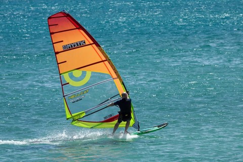 Windsurfer surfing in the sea