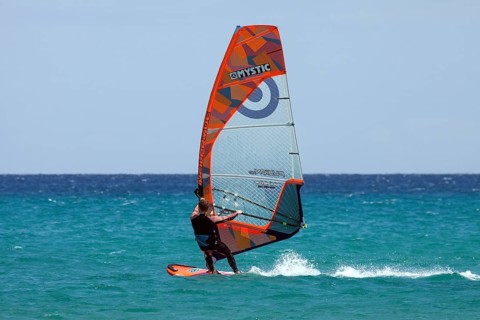 Windsurfer surfing in the sea